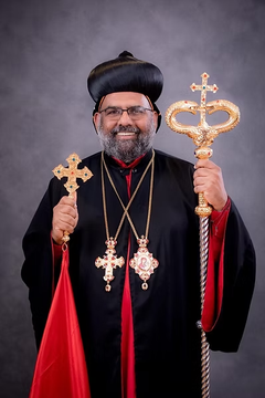 Portrait of a church leader holding a cross and staff.